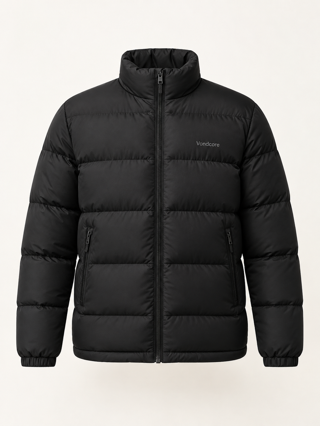 Vondcore Summit Puffer Jacket in black, front view with stand collar, full zipper and quilted body.