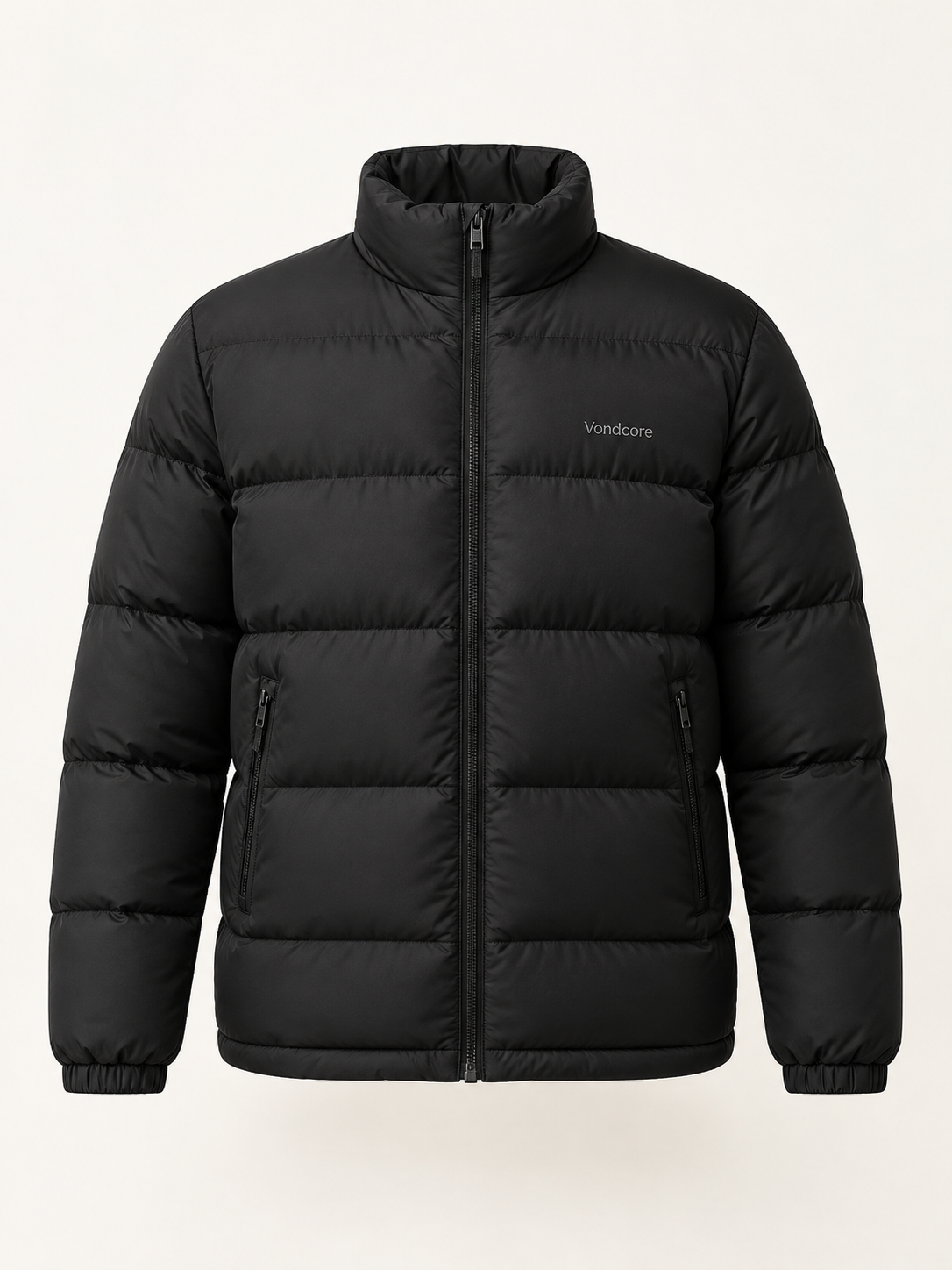 Vondcore Summit Puffer Jacket in black, front view with stand collar, full zipper and quilted body.