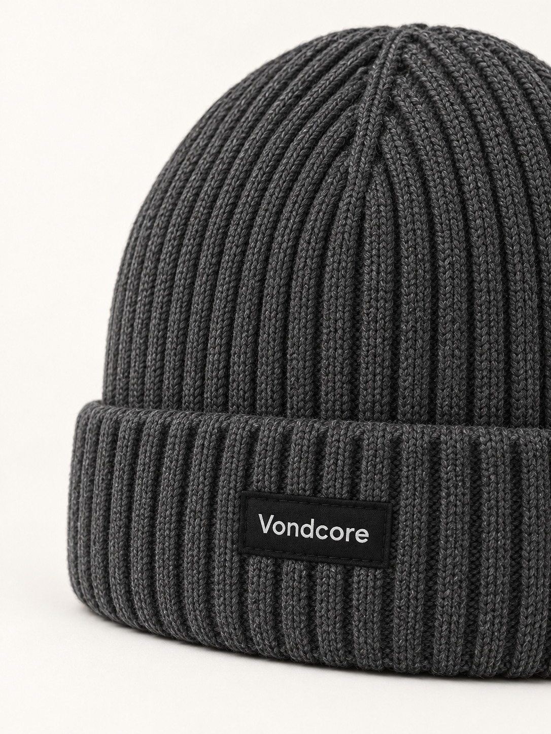Detail of the charcoal Vondcore Frost Rib Beanie showing rib knit texture and centered Vondcore cuff label.